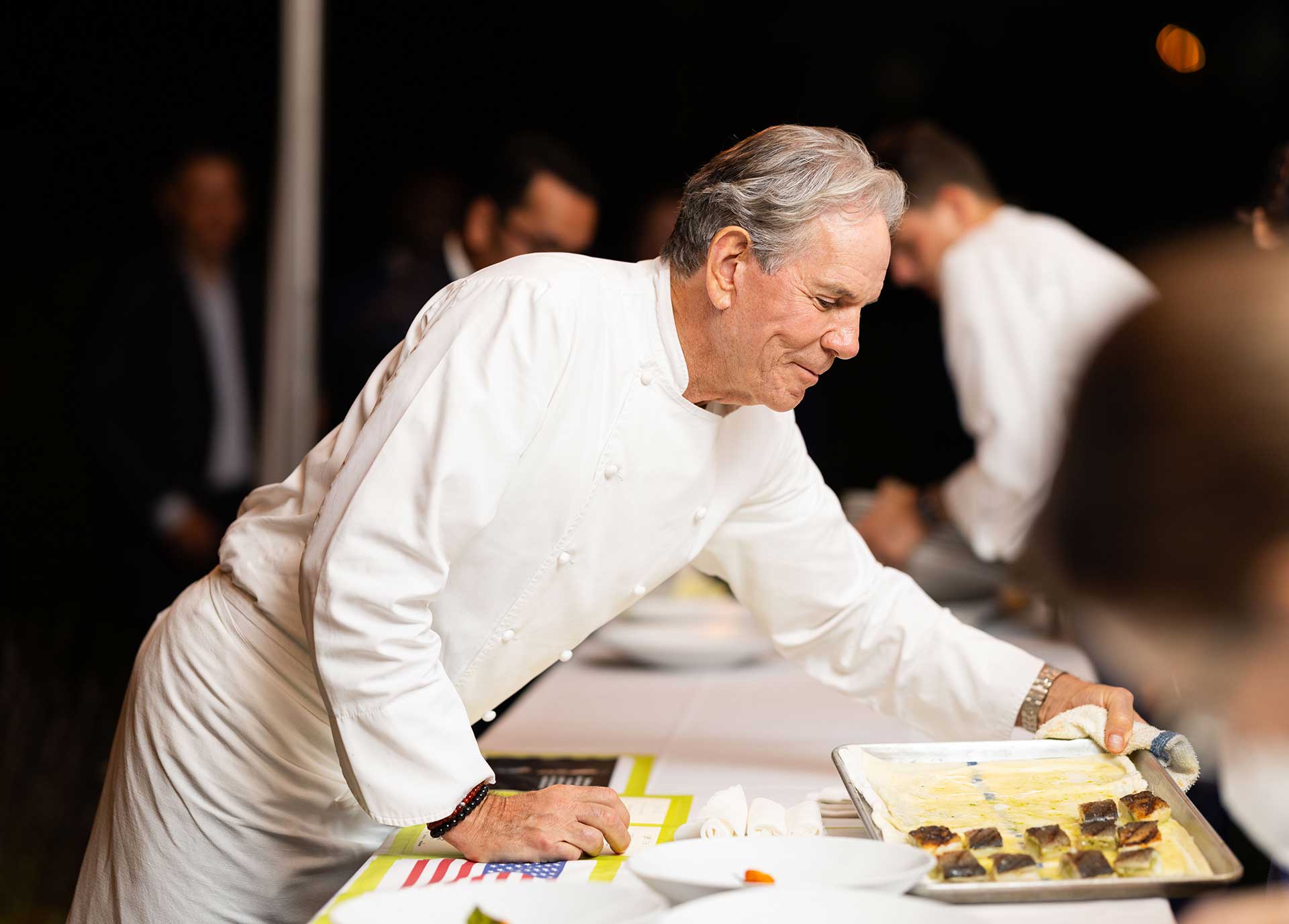 Chef Thomas Keller preparing dinner