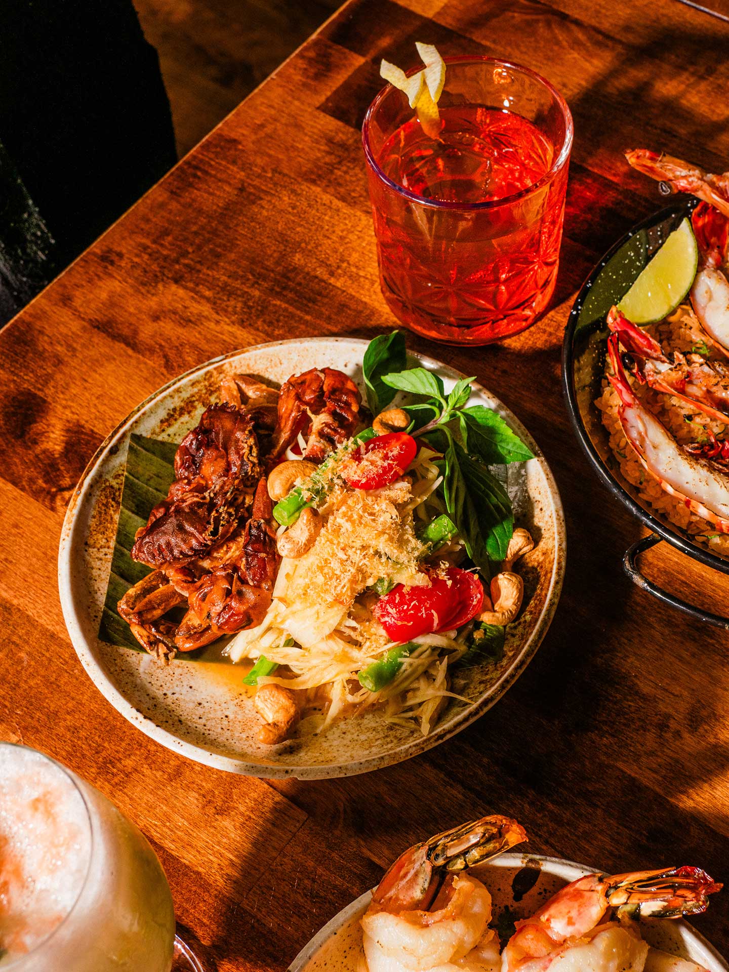 ©Chris McIntosh/Mahaniyom - Mahaniyom Sazerac Paired with Som Tum Poo Nim