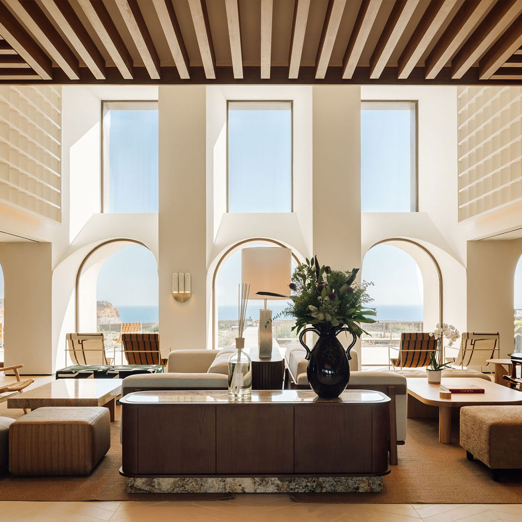 The surf-centric boutique hotel sits 130 feet above Calada Beach on a sandstone bluff. © Aethos Ericeira