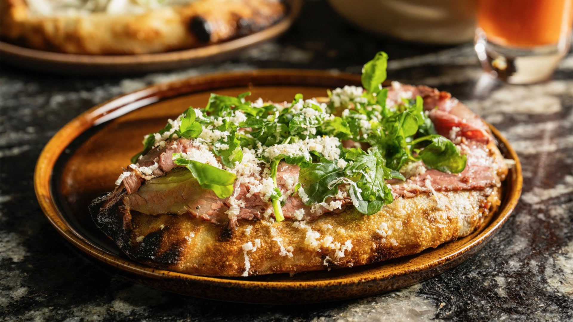 Crown Shy Tandoori Flatbread with short rib, horseradish, and black pepper - ©Crown Shy