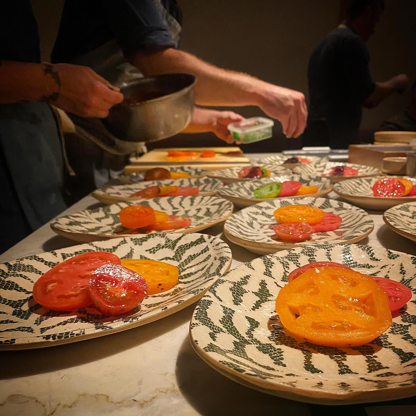 Plating Farmer Jerry Boone's tomatoes on the Pass - ©Feld