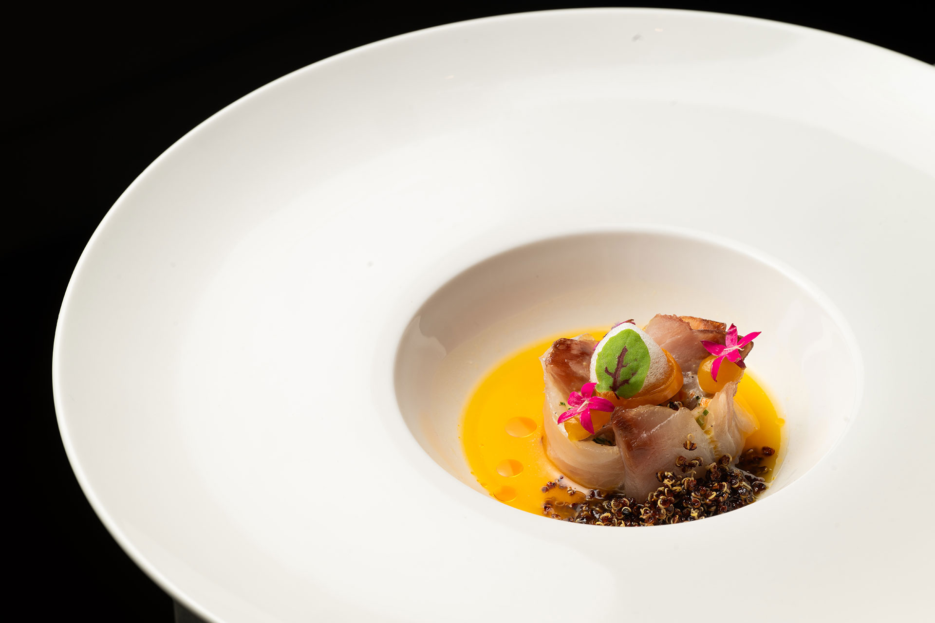 Bite prepared by Chef Paco Morales of Noor