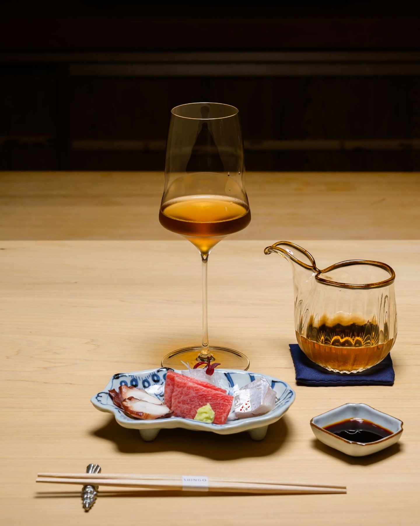 The sashimi includes tako (octopus from Tokyo bay, Kama toro (fatty tuna collar from Oma), And tachiuo (belt fish from Fukuoka) - ©Salar Abduaziz/Shingo