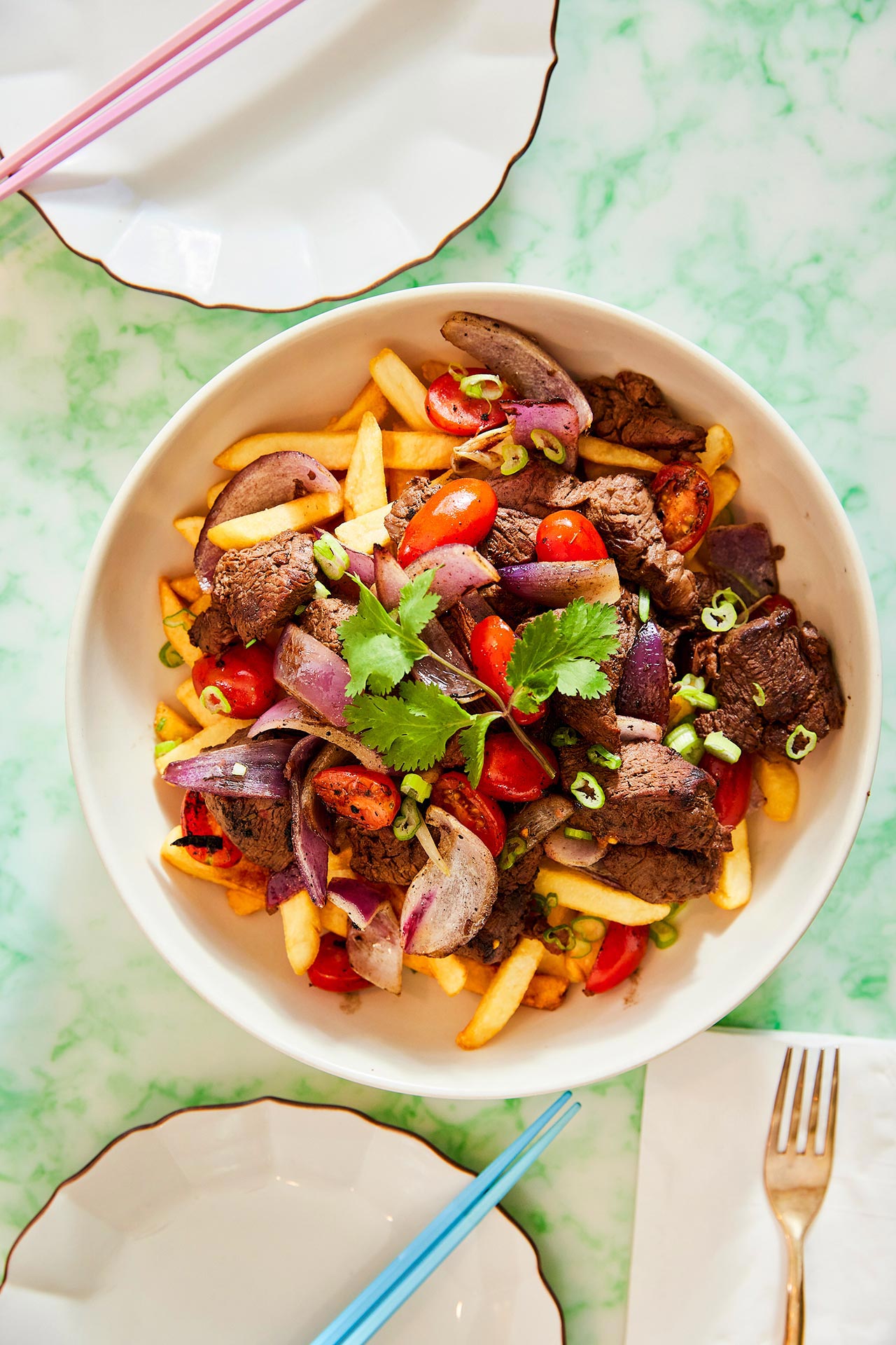 The lomo saltado at Chifa, with wood-grilled filet mignon and cherry tomatoes. ©Chifa