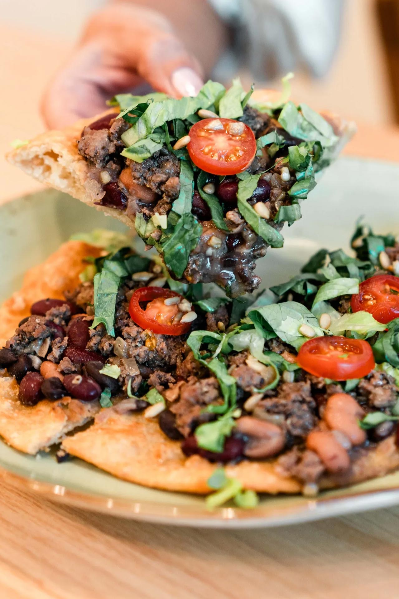 Ground bison fry bread, part of the year-round Native American menu at Flavors from Afar. ©Flavors from Afar